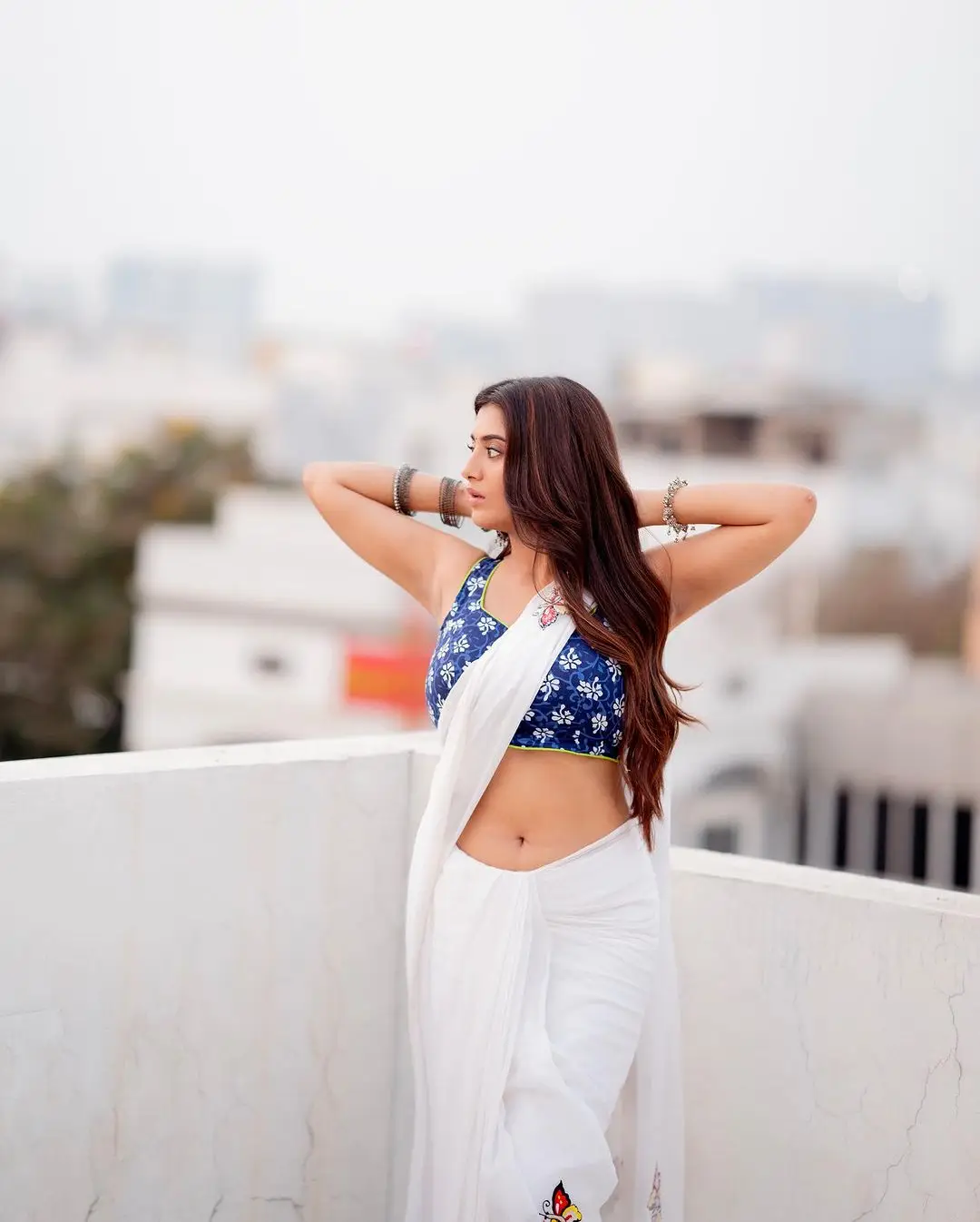 Rashi Singh in White Saree Blue Sleeveless Blouse